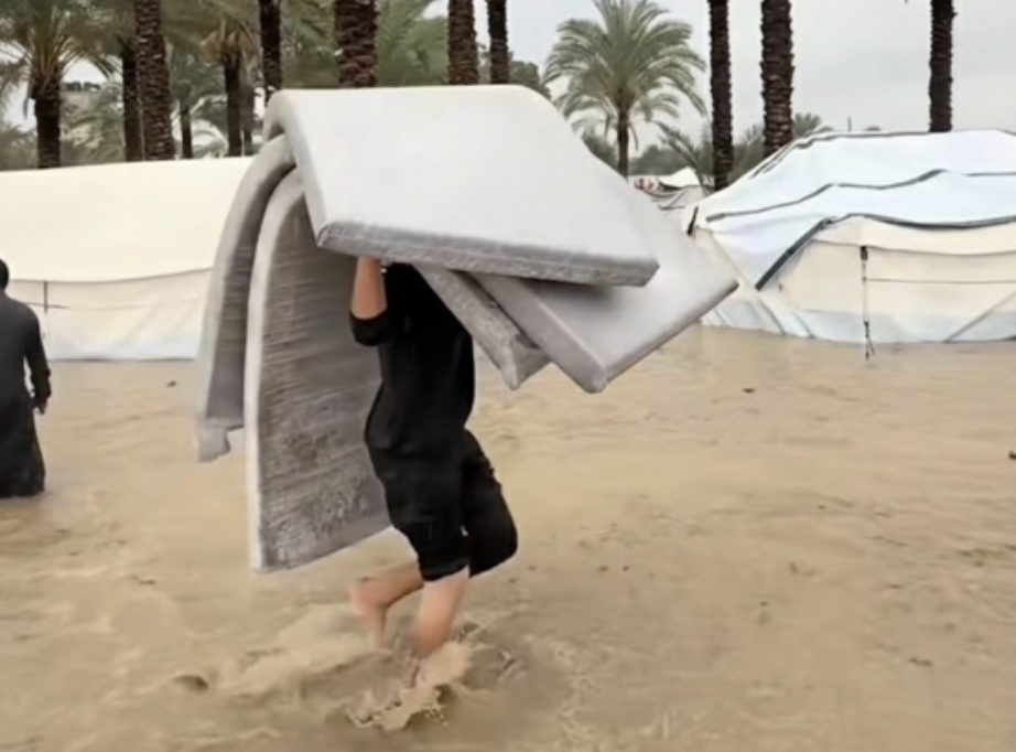 71. Boy saving matresses in flood [$2000]