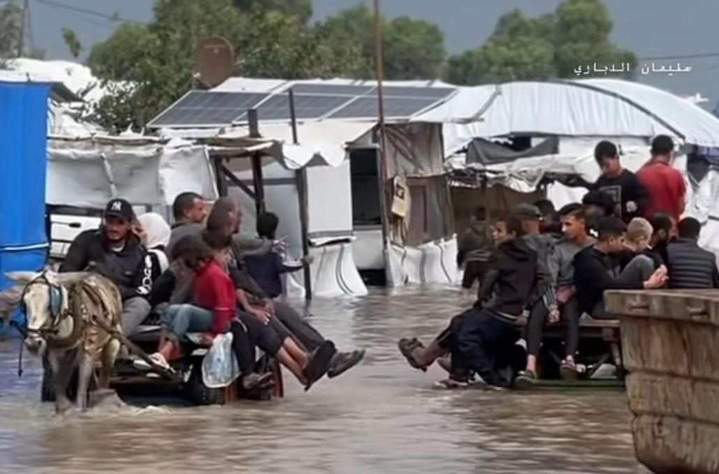 72. On donkey carts amid flood [$2000]