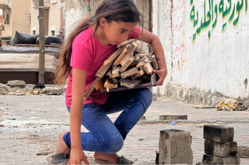 77. Girl collecting firewood [$2000]